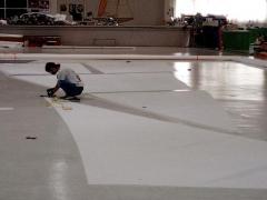 Segelbahnen werden zu einem neuen Segel zusammengefügt